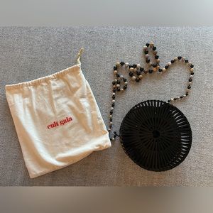 Black cult gaia bag with marble shoulder strap